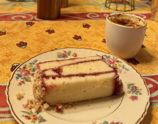 slice of birthday pound cake w flan brulee
